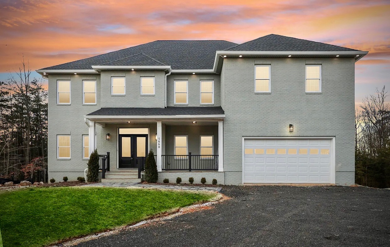 New construction home with exterior lighting in Winchester VA